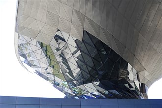 Close-up of a futuristic facade with reflective glass panels, BMW WELT, Munich, Germany, Europe
