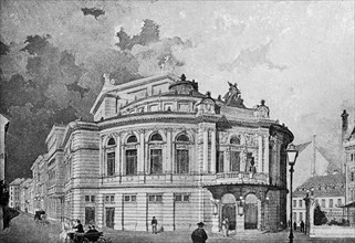 Raimung Theatre in Vienna, round building, street, walker, statues, ornamentation, lantern,