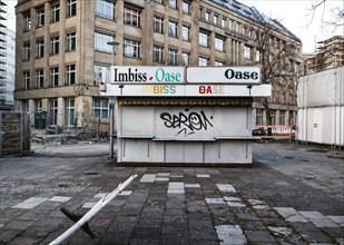 A different idea of an oasis. The closed, iconic snack bar Oase on Alexanderplatz, Berlin,