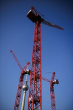 Symbolic photo on the topic 'Aeo Building in Berlin 'Aeo. Construction cranes stand on a building