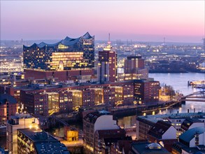 Aerial view of Hamburg harbour and the Elbe Philharmonic Hall concert hall at blue hour, Hamburg,