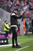 Coach Thomas Tuchel FC Bayern Muenchen FCB on the sidelines clapping his hands in encouragement,