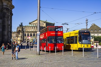 Tourist and traffic situation, double-decker bus for city tours and tram line 8 on the Schlossplatz
