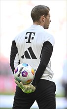 Goalkeeper coach Michael Rechner FC Bayern Munich FCB holds Adidas Derbystar match ball on his