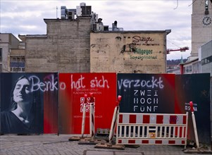 Graffiti on construction fence, BENKO HAT SICH VERZOCKT, construction site, controversial