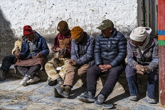 Local men having break, Lo Manthang, Kingdom of Mustang, Nepal, Asia