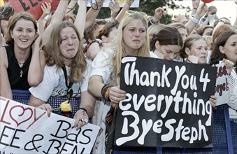 Fans of the boy band Caught in the Act cry and scream during the last concert of the Dutch boy band