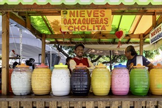 Oaxaca, Mexico, A stand on a busy street sells flavored cold drinks, Central America