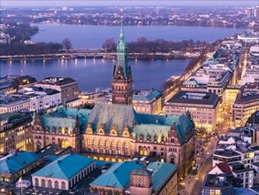 Aerial view of Hamburg City Hall with Inner Alster and Outer Alster Lake at blue hour, Hamburg,