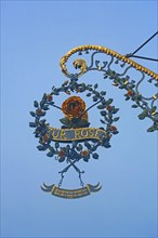 Nose sign of the restaurant Zur Rose, rose figure, inscription, golden, free-standing, main street,