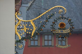 Nose sign of the restaurant Zur Rose, rose figure, inscription, lden, main street, Ochsenfurt,