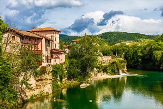 View from the 15th century Ponte del Diavolo leading over the Natisone river into the historic