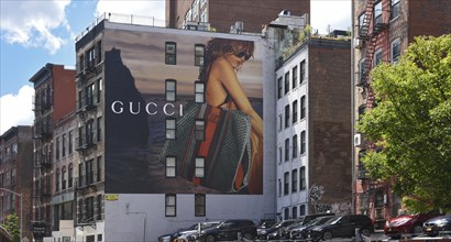 Hand-painted mural, woman with bag, advert for GUCCI, SoHo district, Manhattan, New York City, New