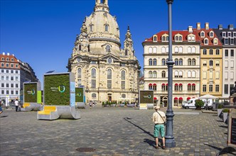 Tourist scene in front of the Church of Our Lady on the Neumarkt in Dresden, Saxony, Germany, for