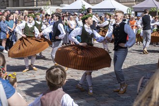 Riga. Ligo Festival. Folk dance groups on the city square, Riga, Latvia, Europe