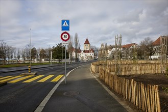 Quai de Belgique with zebra crossing and view towards Ouchy Castle in the Ouchy district, Lausanne,