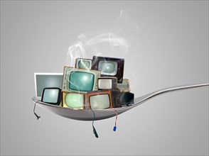 Cosum behaviour, television sets stacked on a spoon
