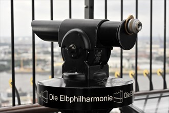 Black telescope with the inscription 'The Elbe Philharmonic Hall' on a vantage point, Hamburg,