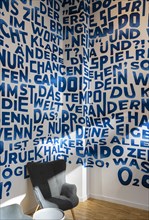 Decorative wall with letters and words, event space Basecamp, Mittelstrasse, Berlin, Germany,