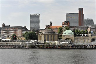 View of the Hamburg waterfront promenade with classic buildings during the day, Hamburg, Hanseatic