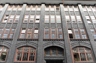 Facade of a brick building in the Kontorhaus district with several windows, Hamburg, Hanseatic City