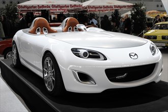 RETRO CLASSICS 2010, Stuttgart Messe, A white Mazda convertible sports car model presented at a