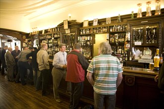 Customers standing at the bar, The Grill Bar, Aberdeen, Scotland, United Kingdom, Europe