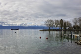 View of Lake Geneva with cargo ship from the Ouchy neighbourhood, Lausanne, Lausanne district,