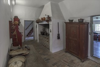 Kitchen with cooking area in a historic farmhouse from the 19th century, Open-Air Museum of