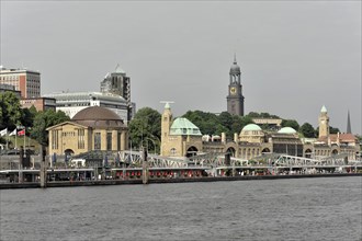 The Hamburg Landungsbruecken with surrounding buildings under a clear sky, Hamburg, Hanseatic City