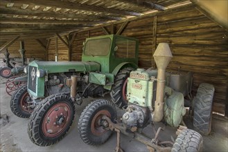 Tractors, on the right a Lanz Bulldog from 1932, in a shelter, Schwerin-Muess Open-Air Museum of