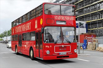 A red double-decker bus for sightseeing on a street in Hamburg, Hamburg, Hanseatic City of Hamburg,
