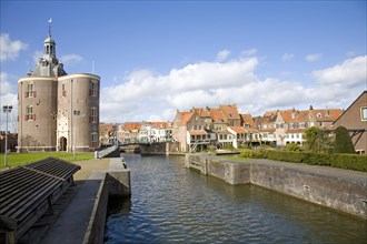 Drommedaris tower and attractive historic waterside buildings, Enkhuizen, Netherlands