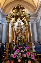 Madonna Santa Maria Statue and People Praying Inside the Church of San Nazzaro (Croglio) in