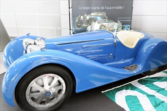 RETRO CLASSICS 2010, Stuttgart Trade Fair Centre, Light blue classic sports car in an exhibition,