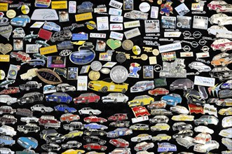 RETRO CLASSICS 2010, Stuttgart Messe, A collection of automobile badges with advertising logos,