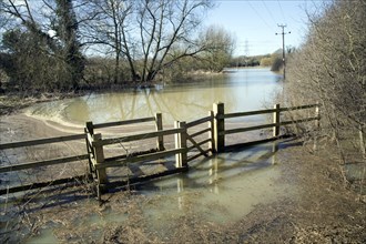Field flooded by Belstead Brook overflow, Ipswich, Suffolk, England, UK