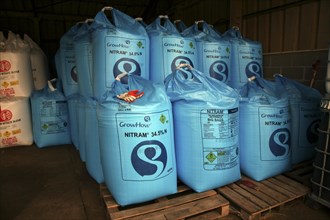 Nitram fertiliser bags stored in a barn, England, UK
