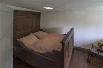 Bedroom of the married couple in a historic farmhouse from the 19th century, Open-Air Museum of