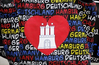 A fabric with a Hamburg heart emblem and lettering on a black background, Hamburg, Hanseatic City