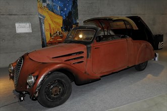 A red vintage car in unrestored condition with rust and patina, Stuttgart Messe, Stuttgart,