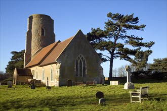 Round tower and nave of All Saints church, Ramsholt, Suffolk, England, United Kingdom, Europe