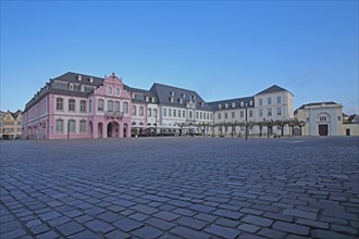 Late baroque Palais Walderdorff with historic building complex, cobblestones, view from below,
