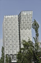 TANZENDE TUeRME, hotel and office building, completed in 2012, angled building with modern glass