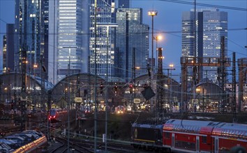 Trains at Frankfurt Central Station, Frankfurt skyline with skyscrapers in the background,