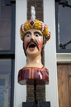 A gaper head identifying pharmacist shop, Delft, Netherlands