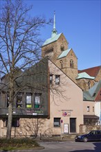 Commercial building and tower of Minden Cathedral, Muehlenkreis Minden-Luebbecke, North