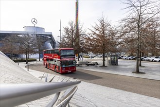 Stuttgrt Citytour. City tour in a red double-decker. City view of Stuttgart in front of the