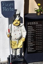 Chef advertising figure with pizza-pasta advert, Allgaeu, Bavaria, Germany, Europe