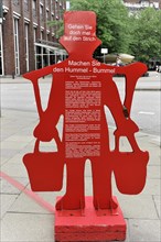 Hans Hummel information figure, at the start of a marked path through the historic centre of the